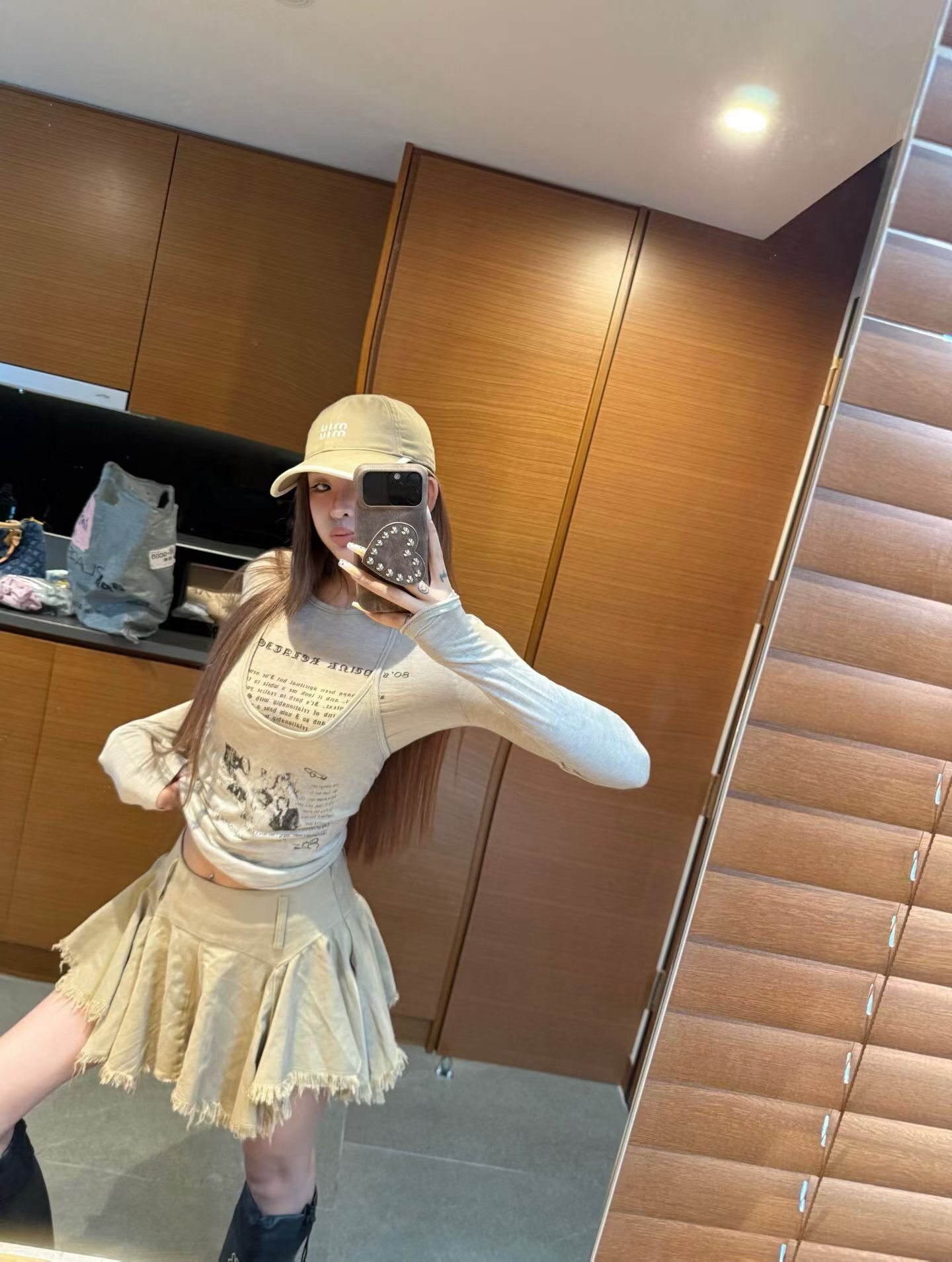 MIDO家 2026秋季新款韩版时尚百搭宽松设计感不规则毛边半身裙女