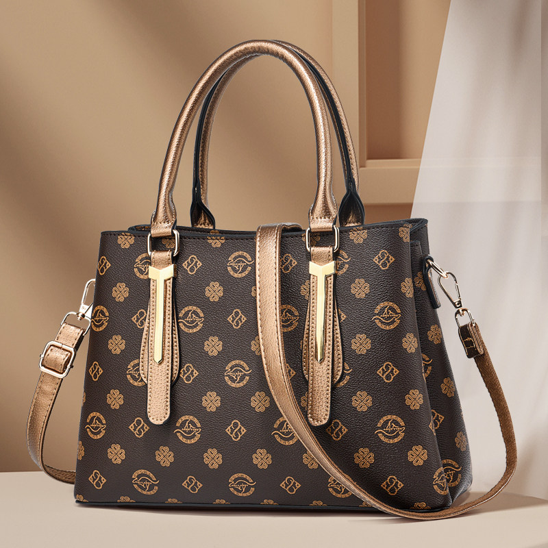 真皮包包女士2025新款宽带斜挎包手提单肩包高级感经典老花托特包