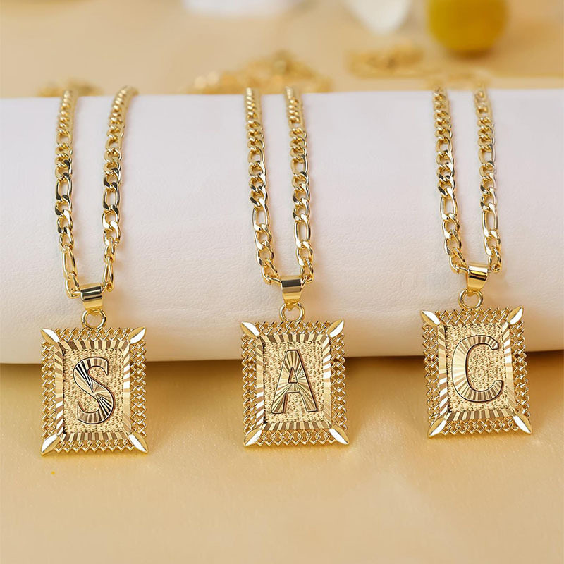 跨境热销饰品NK链男士英文26字母吊坠配饰方形镂空情侣字母项链女