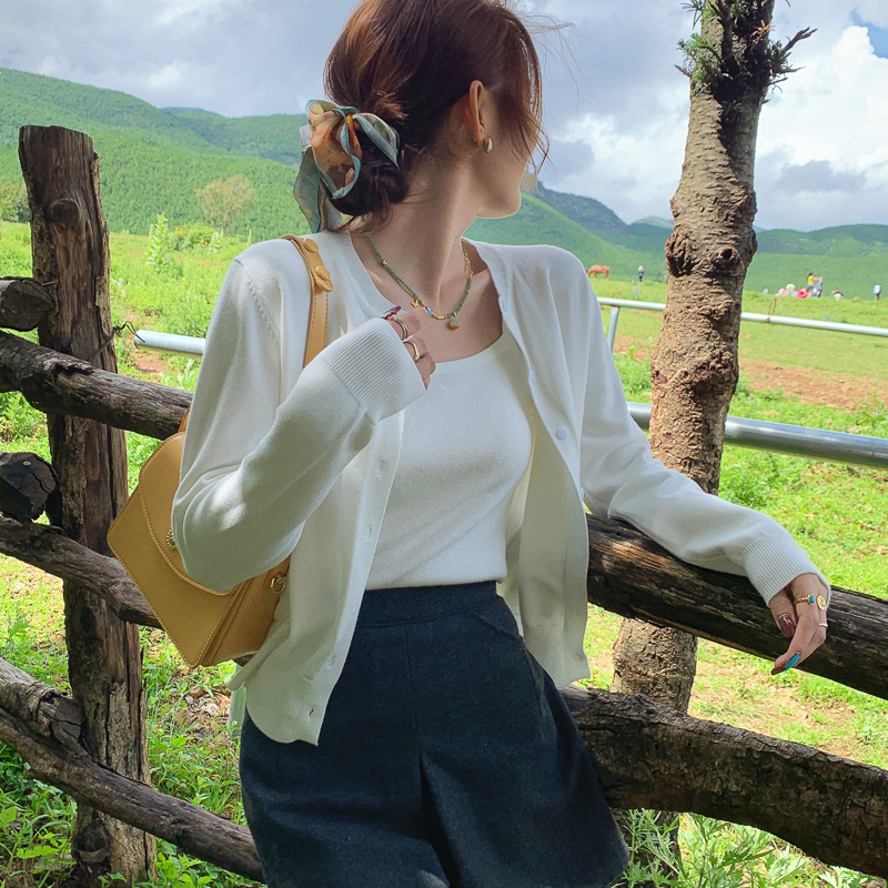 白色针织开衫女装外搭2025春夏季新款薄款毛衣外套宽松独特小上衣