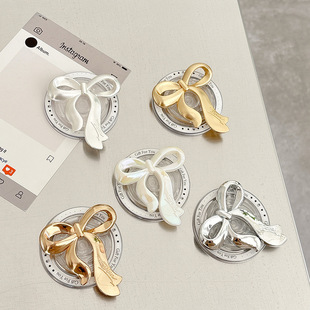 新款创意蝴蝶结磁吸手机壳气囊支架可伸缩拆卸便携式懒人桌面支架