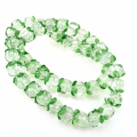 10 прозрачных бусин в виде тыквы диаметром 14 мм.