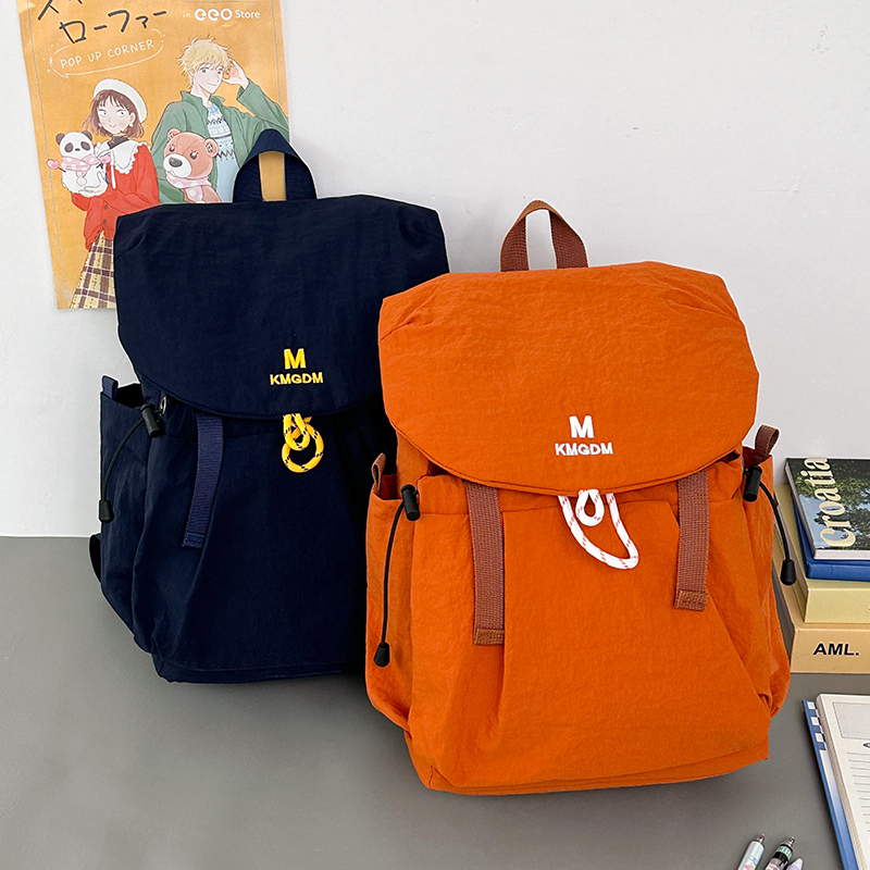 2025新款韩版轻便户外双肩包防泼水布包男女童出背包中小学生书包