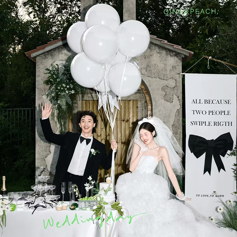 结婚拍照道具领证婚礼晨袍婚纱照黑色蝴蝶结背景影楼外景拍摄道具