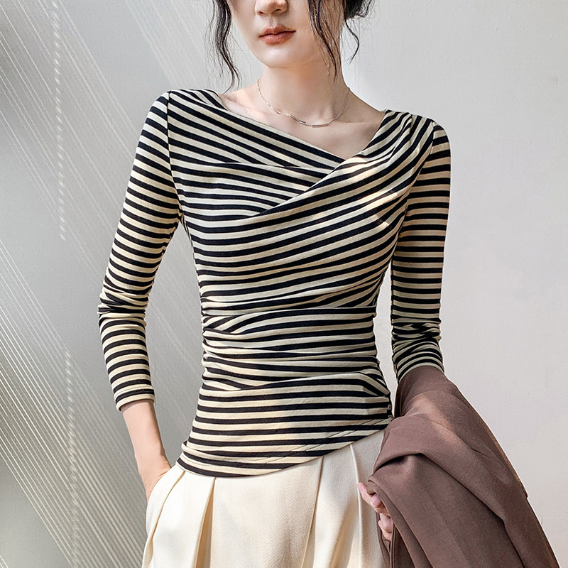 一字肩条纹长袖t恤女2026早春新款修身显瘦设计感不规则斜肩上衣