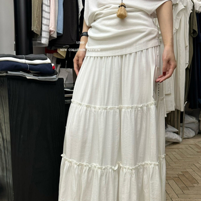 LIMO腰部打揽纯色蛋糕半身长裙