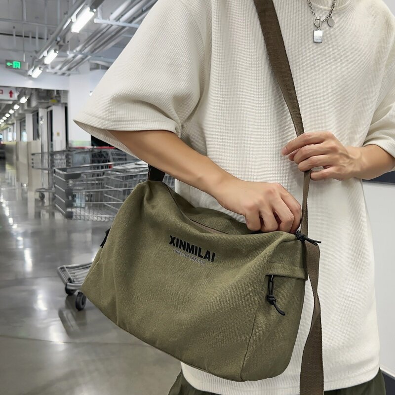 斜挎包女大学生通勤复古风帆布包男款大容量简约休闲单肩包小背包