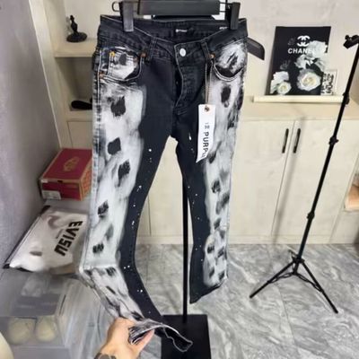 破洞补丁涂鸦字母印花轻奢牛仔裤男款潮牌泼墨修身小脚机车长裤子