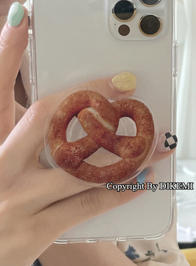 韩国ins椒盐卷饼气囊支架适用iphone15pro/14promax苹果13/11/12proXSmax手机壳