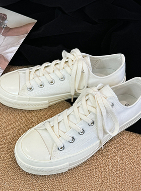 纯白色低帮男女同款情侣百搭休闲平底透气2025春季复古新款帆布鞋