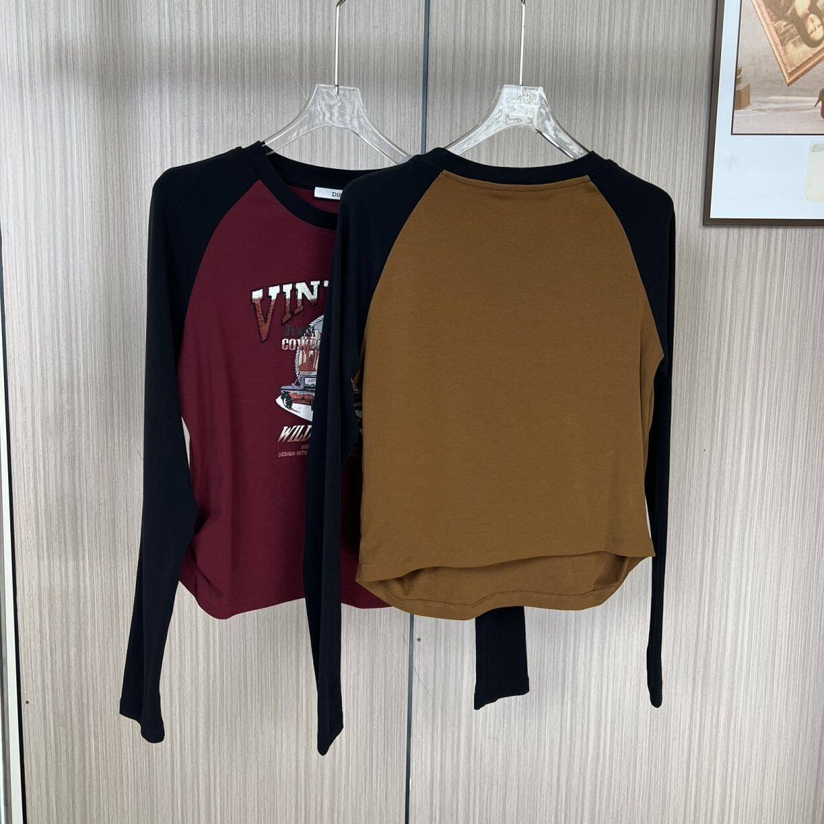 6596品牌撤柜剪标2026秋季新款美式潮牌印花长袖T恤衫上衣短款女