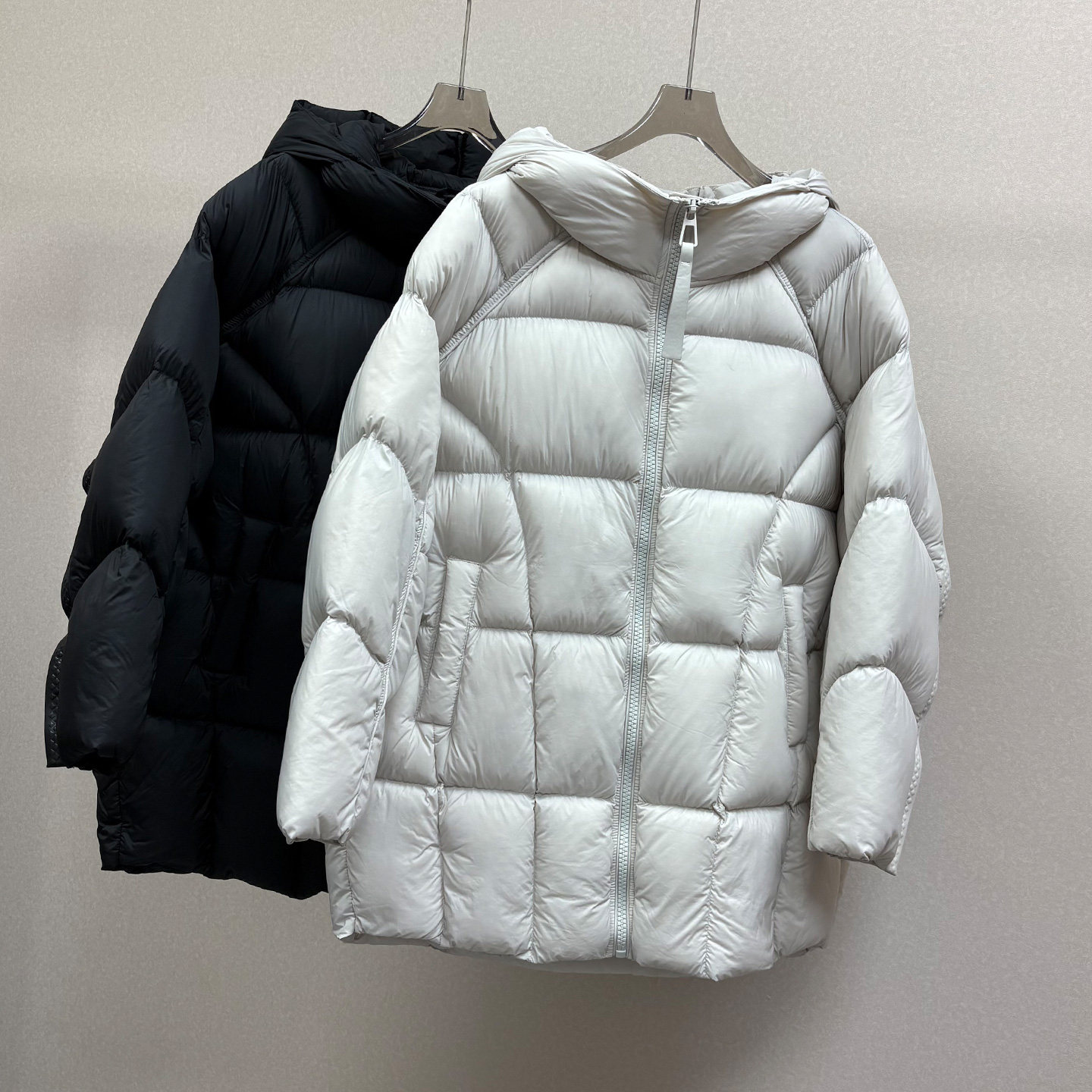 2025冬季新品轻奢羽绒服女士中长款连帽外套茧型宽松大码商场同款
