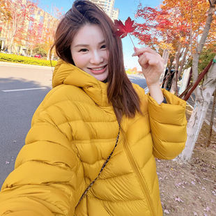 HOTSSS50白鸭绒黄色排骨羽绒服2026冬新款巨好看连帽轻薄保暖短款