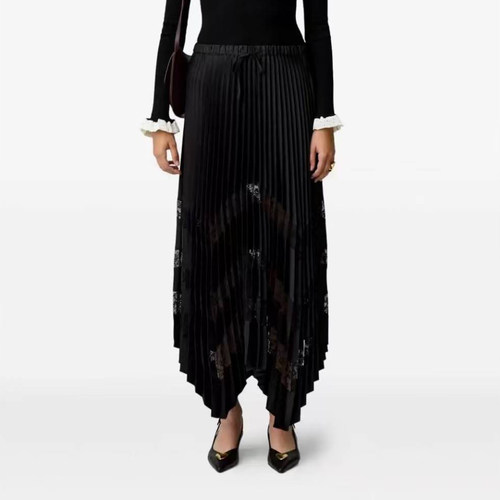 黑色松紧腰百褶拼接不规则半身裙