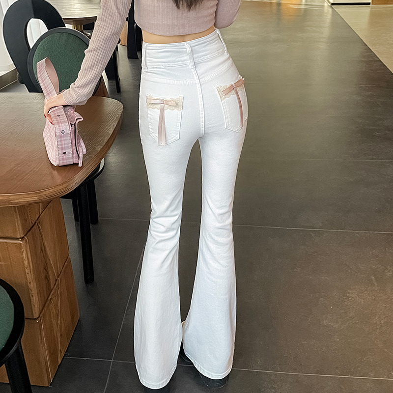 粉色蝴蝶结微喇叭牛仔裤女蜜桃臀