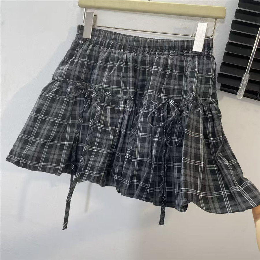 黑色格子蝴蝶结花苞短裙