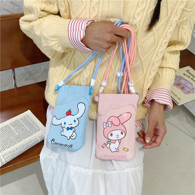 正版三丽鸥口袋斜挎手机包少女包