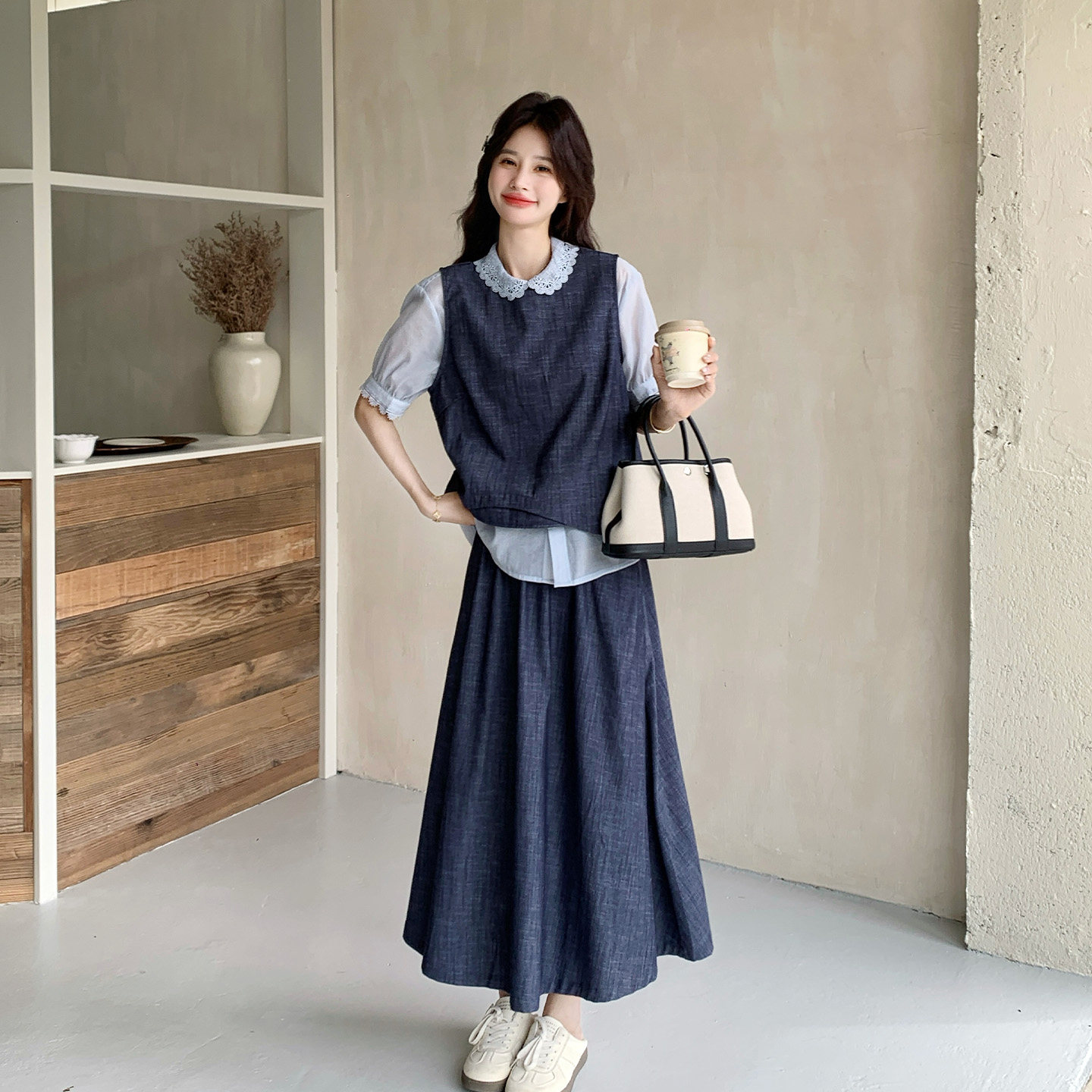 学院风减龄套装女2026夏新款简约宽松背心娃娃领衬衫半身裙三件套