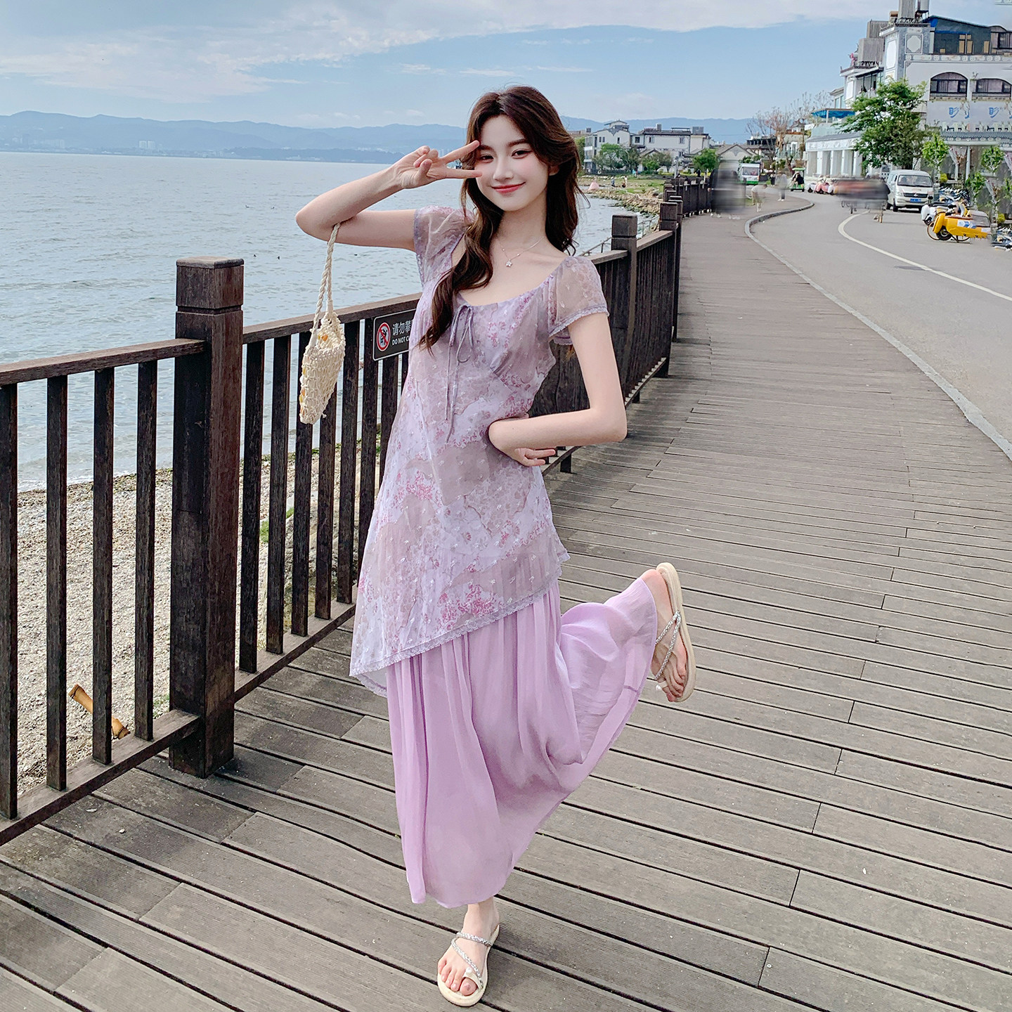 紫色独特绝美设计感连衣裙女2026新款夏日法式不规则假两件碎花裙