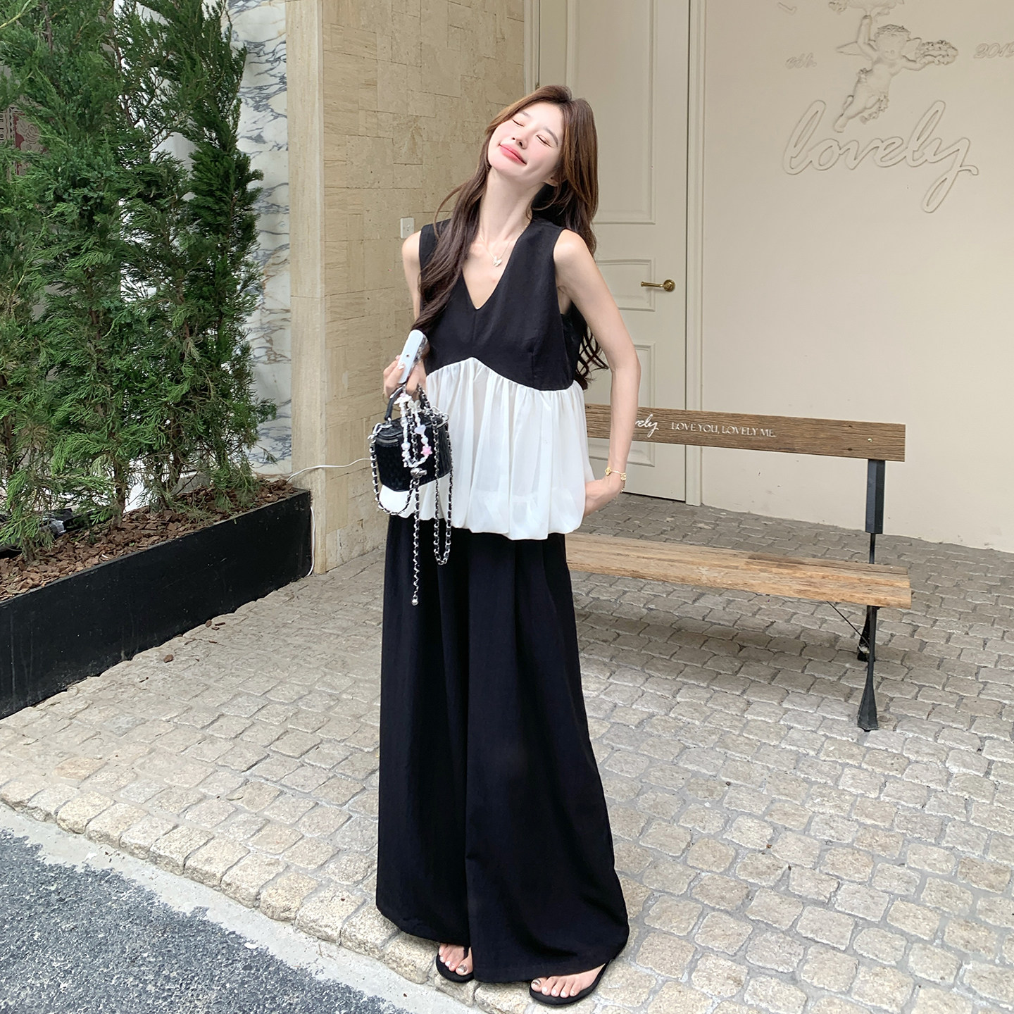 黑色法式优雅款两件套女2026夏新款撞色花苞拼接V领背心长裤套装