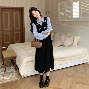 黑色设计感减龄蝴蝶结假两件撞色连衣裙女2026初春新款休闲A字裙