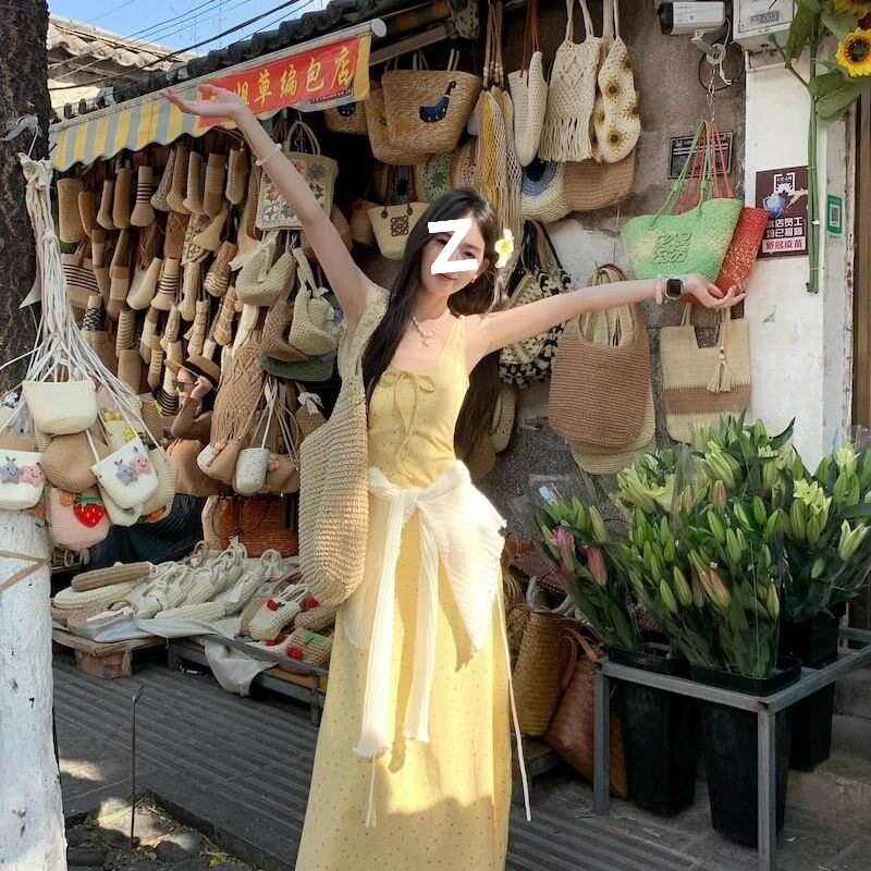 法式黄色碎花吊带连衣裙女夏季海边度假鱼尾长裙早秋可内搭包臀裙