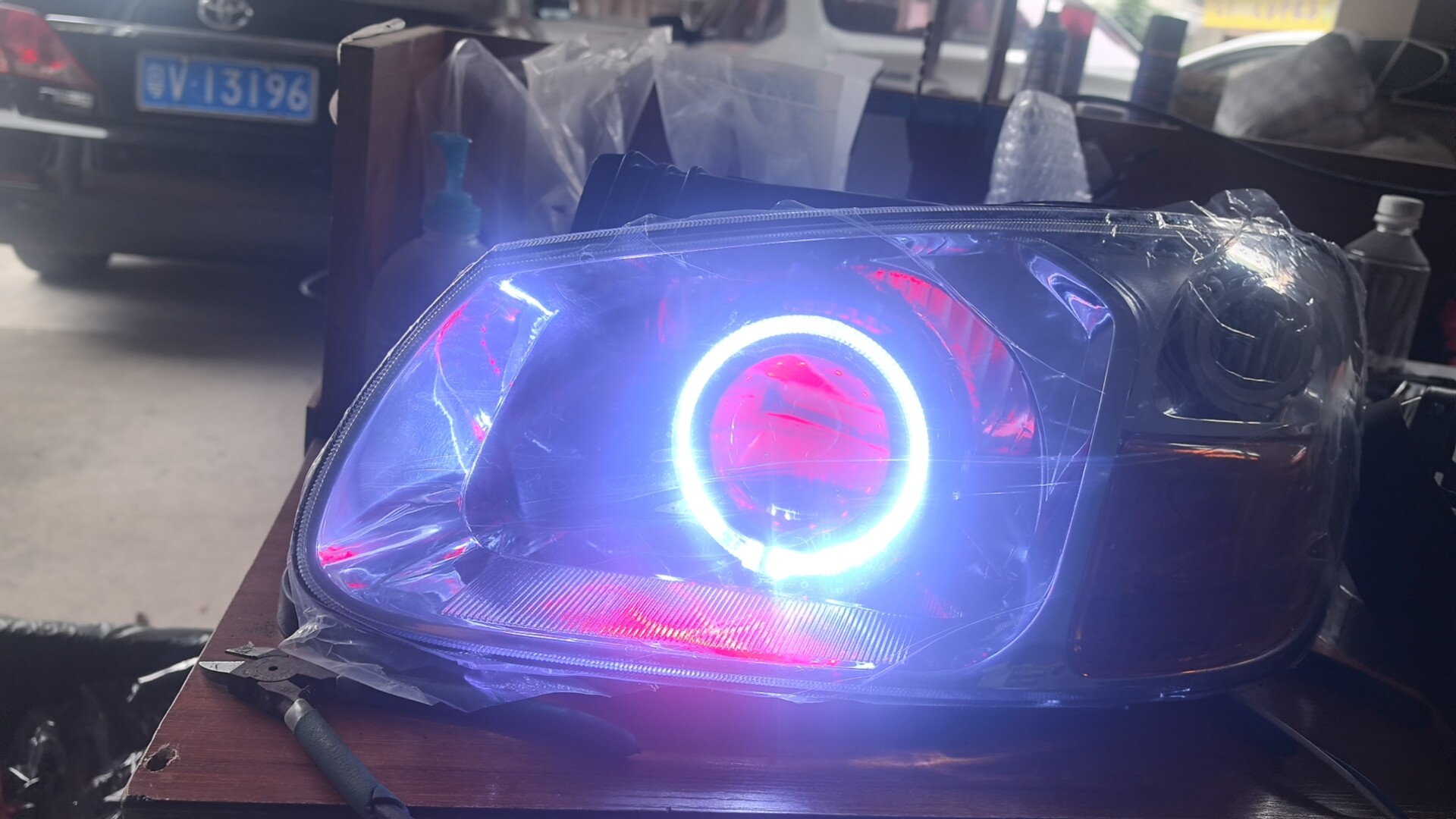 适用起亚老款赛拉图大灯总成改装LED双光透镜天使眼恶魔眼日行灯