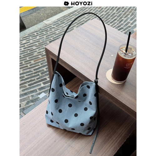 HOYOZI 新品2026 真皮拼波点帆布水桶包女单肩包【小优家包包】