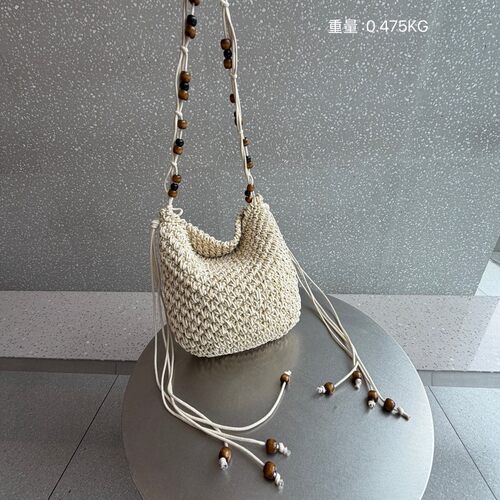 大容量编织包包女2026新款韩版时尚百搭复古托特包度假沙滩水桶包