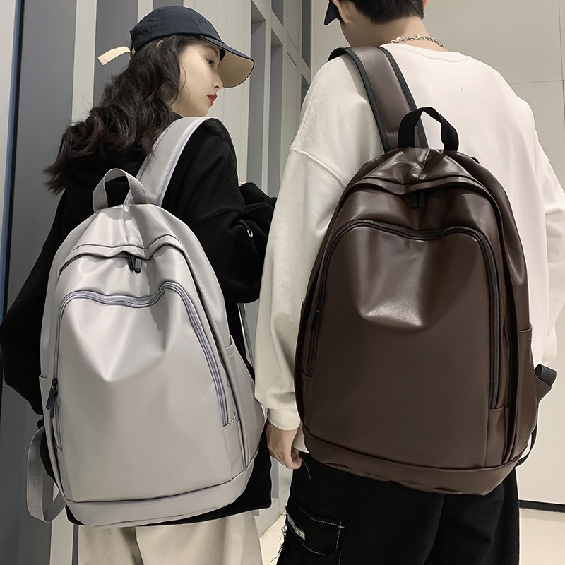 高级感轻奢新款潮大容量防水软皮双肩包通勤男女简约日系学生书包