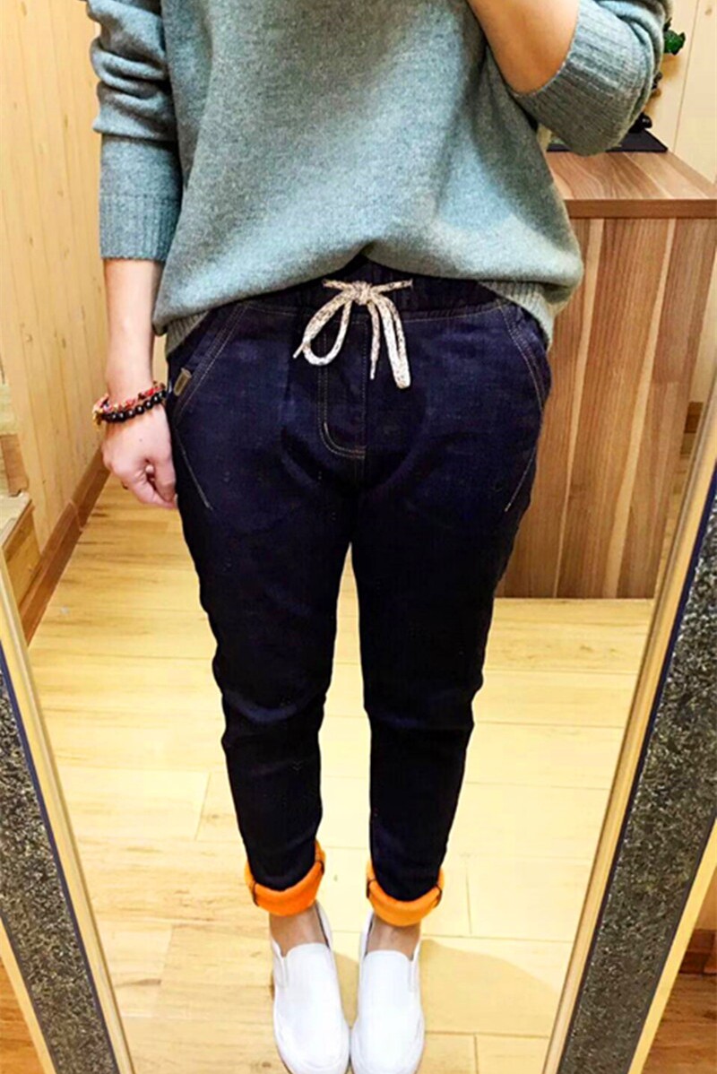 超洋气加绒牛仔裤女冬季松紧腰抽绳加厚拉绒女裤高腰显瘦小脚长裤