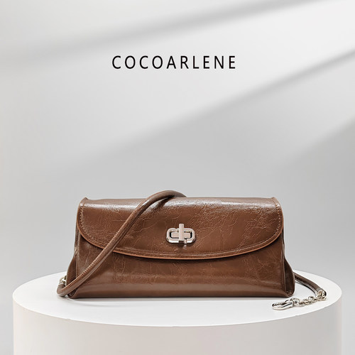 cocoarlene包包时尚百搭洋气法棍包油蜡软皮亮面小众斜挎包85599