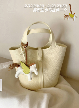 南风Chio2nd 芝芝奶芙水桶包包女淡黄色手提包秋冬超火单肩斜挎包