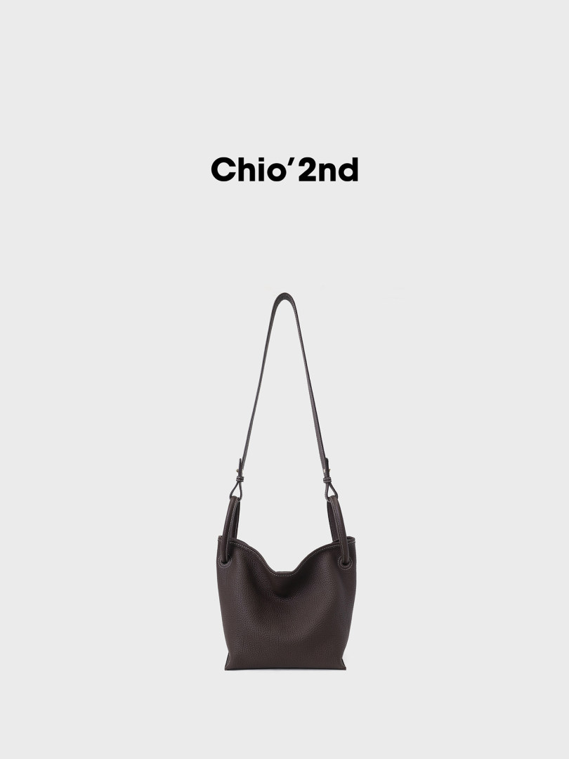 Dark brown leather shoulder bag on a white background