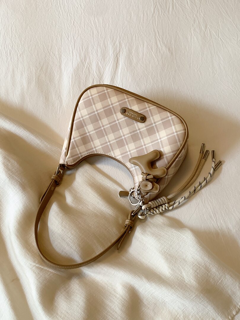 Beige plaid shoulder handbag with strap and key charms