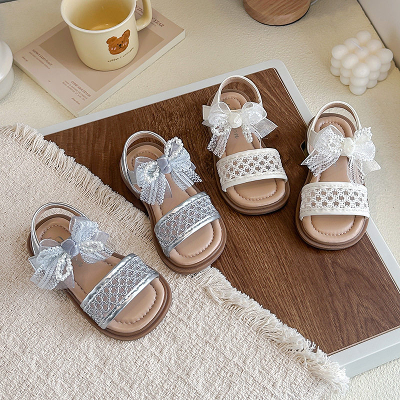 女童新款软底2026蝴蝶结编织公主风韩版凉鞋镂空防滑沙滩夏季凉鞋