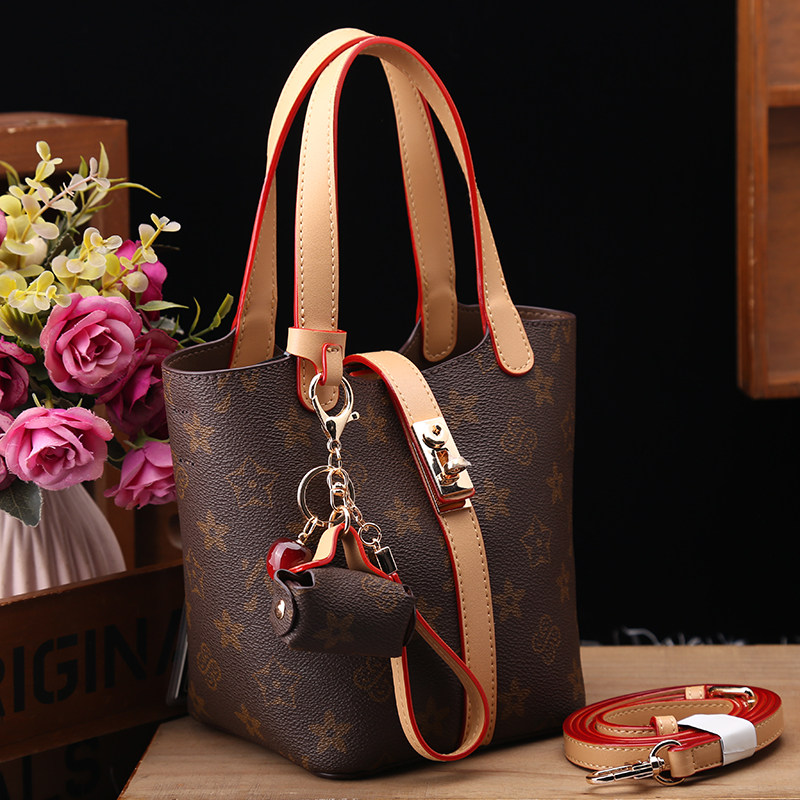 优草坊专柜正品女包真皮手提包2025新款时尚百搭高级感水桶包,箱包皮具/热销女包/男包,水桶包,淘宝优惠券,粉丝福利购,淘宝优惠卷