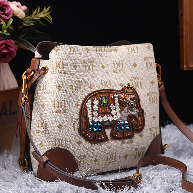 专柜正品真皮女包2025新款时尚百搭高级感卡通猫头鹰单肩水桶大包,箱包皮具/热销女包/男包,水桶包,淘宝优惠券,粉丝福利购,淘宝优惠卷