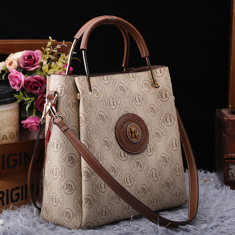 古萨驰真皮水桶包女新款2025高级感单肩斜挎包今年流行手提大包,箱包皮具/热销女包/男包,托特包,淘宝优惠券,粉丝福利购,淘宝优惠卷