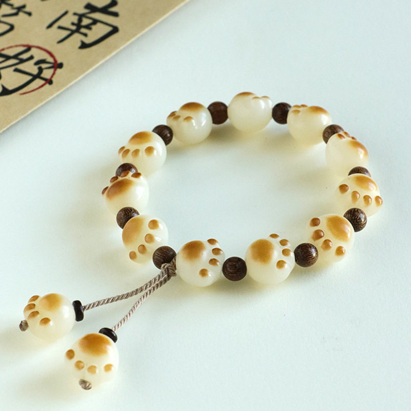 新品白玉菩提根炭烧招财猫爪手链女金丝檀木流苏红玛瑙手串