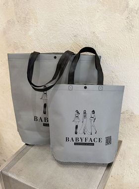 浅灰色竖款服装无纺布手提袋定制logo环保礼品购物袋带暗扣