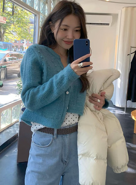 陆续2025冬季新韩国东大门tan*at气质纯色圆领单排扣镂空针织开衫
