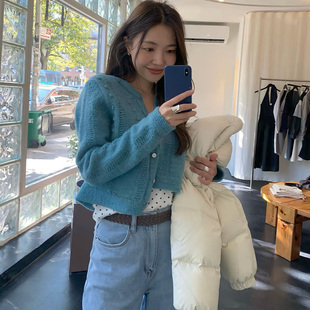 at气质纯色圆领单排扣镂空针织开衫 陆续2025冬季 新韩国东大门tan