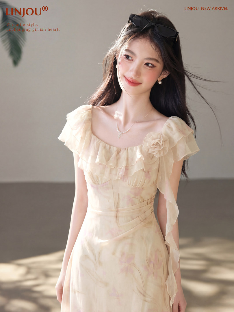 Model wearing a cream off-shoulder ruffled dress