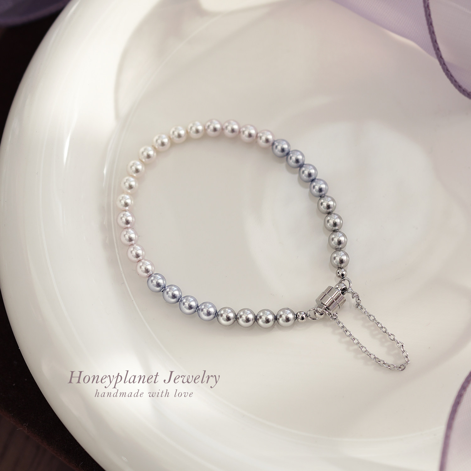 森糖星球*渐变粉薰衣草紫施家正圆强光珍珠磁铁扣弹力绳手链气质