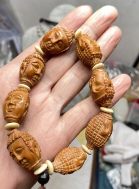赔钱清仓处理天然橄榄核手串精工雕刻八佛头手链送礼品