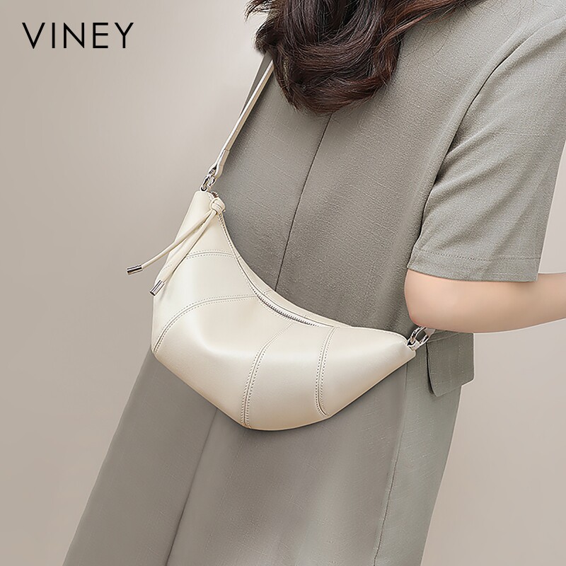 Viney包包女款2026新款女包夏天真皮单牛角包高级感肩斜挎饺子包