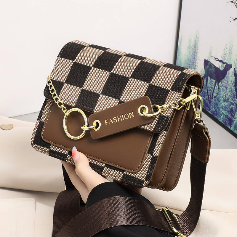 卡丹路女包城市生活官方旗舰店红谷斜挎包高级感小包马鞍腋下女包