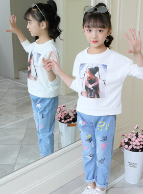 热销童装牛仔裤春秋季卡通印花破洞裤厂家直供儿童宝宝百搭长裤