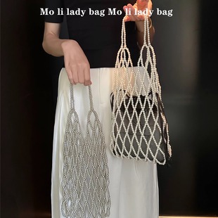 2025夏季韩国小众设计感超仙法式甜美镂空串珠编织购物袋网兜包